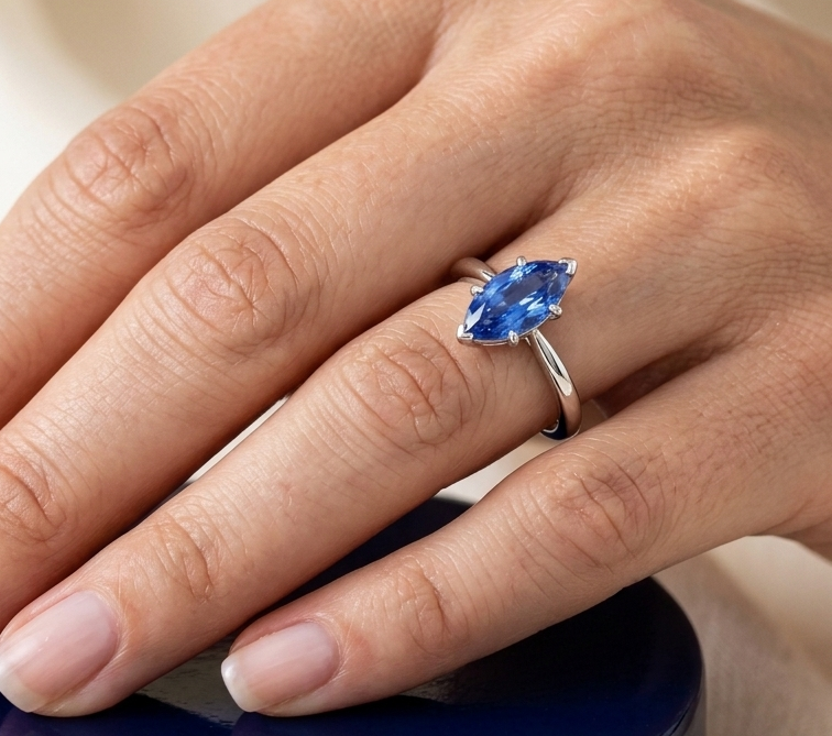 BLUE SAPPHIRE MARQUISE-CUT SOLITAIRE ENGAGEMENT RING