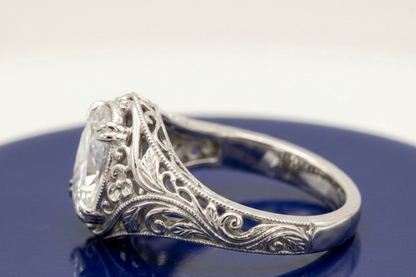 OVAL DIAMOND VINTAGE ENGAGEMENT RING