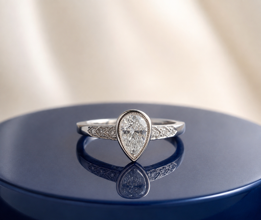 VINTAGE PEAR DIAMOND ENGAGEMENT RING