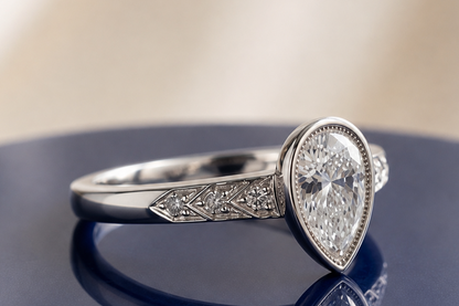 VINTAGE PEAR DIAMOND ENGAGEMENT RING