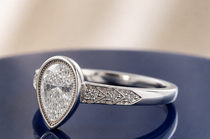 VINTAGE PEAR DIAMOND ENGAGEMENT RING
