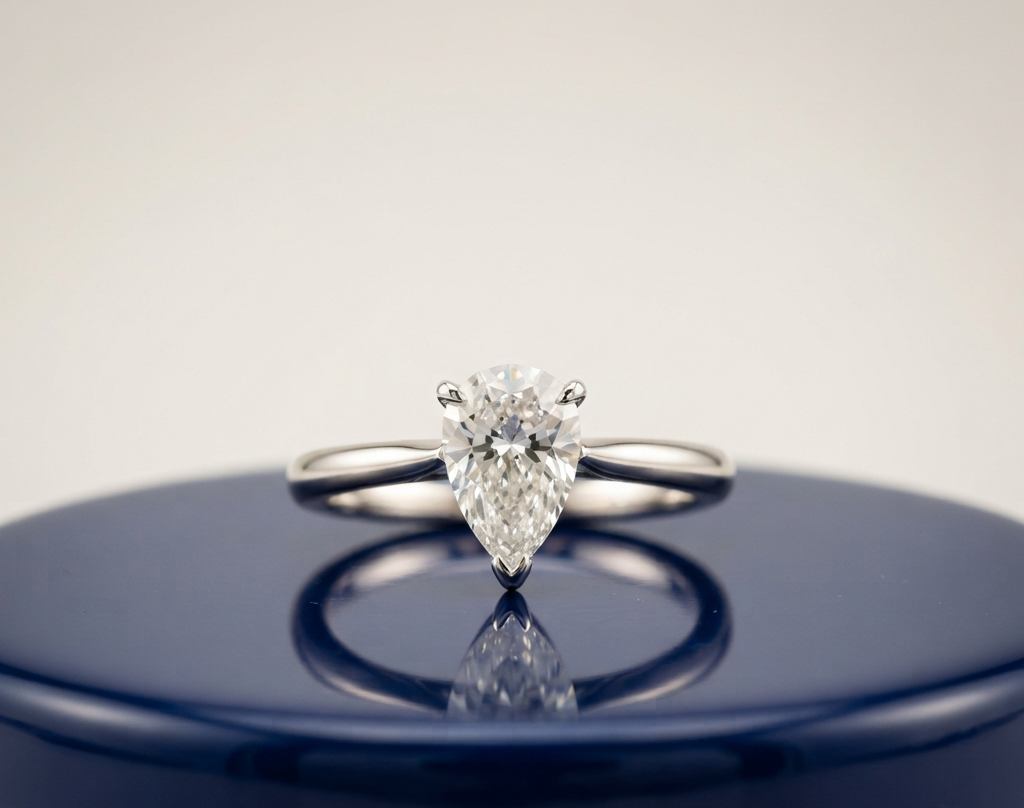 SOLITAIRE PEAR ENGAGEMENT RING