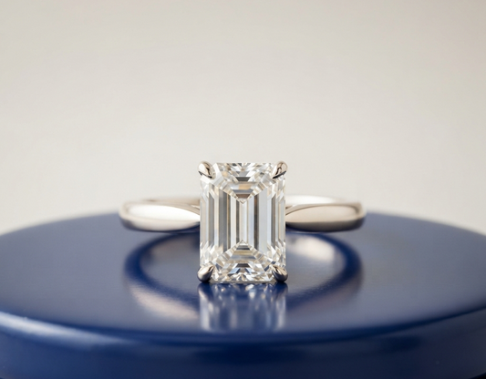 SOLITAIRE EMERALD-CUT ENGAGEMENT RING