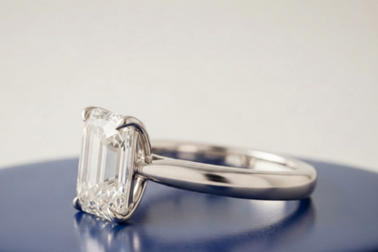 SOLITAIRE EMERALD-CUT ENGAGEMENT RING