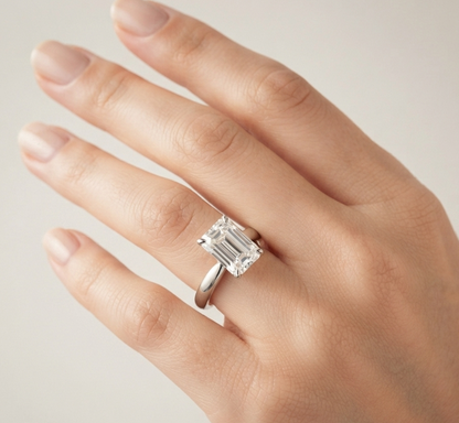 SOLITAIRE EMERALD-CUT ENGAGEMENT RING