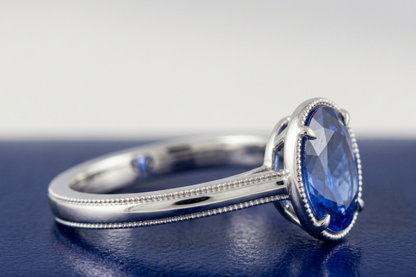 BLUE SAPPHIRE OVAL-CUT SOLITAIRE ENGAGEMENT RING