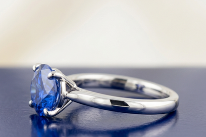 BLUE SAPPHIRE ROUND-CUT SOLITAIRE ENGAGEMENT RING