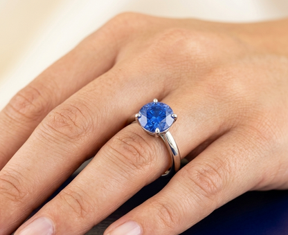 BLUE SAPPHIRE ROUND-CUT SOLITAIRE ENGAGEMENT RING