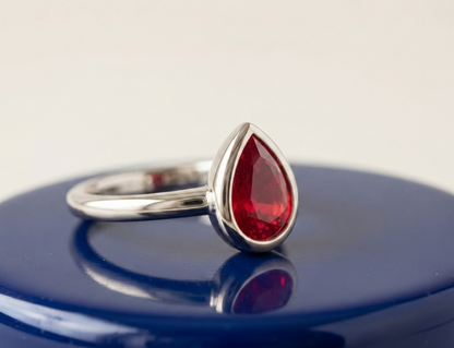 RUBY PEAR-CUT SOLITAIRE ENGAGEMENT RING