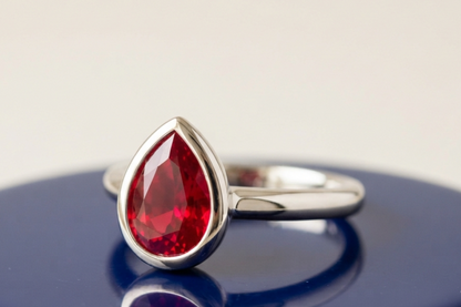 RUBY PEAR-CUT SOLITAIRE ENGAGEMENT RING