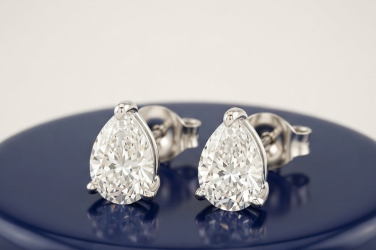 PEAR SOLITAIRE STUD EARINGS